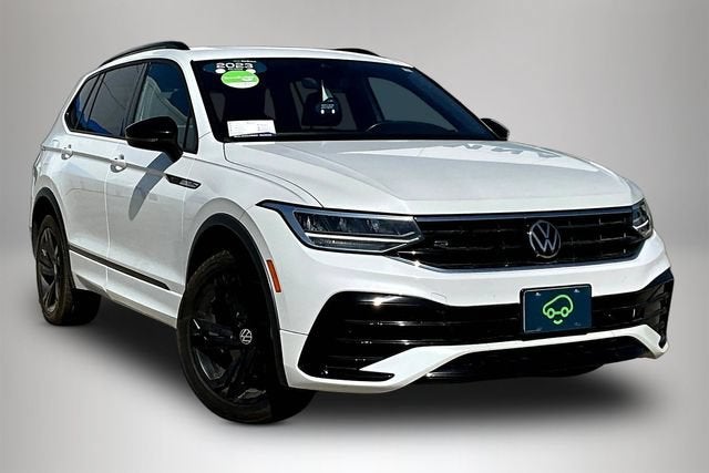 2023 Volkswagen Tiguan 2.0T SE R-Line Black in White — front three-quarter view