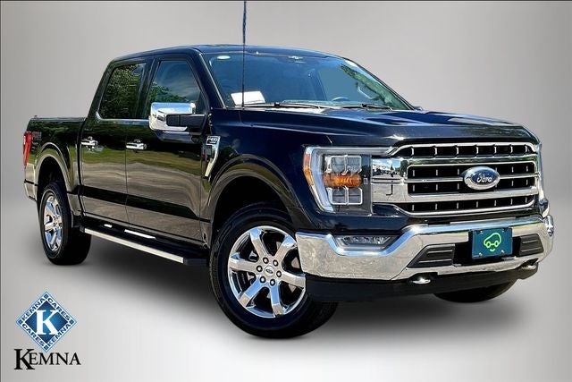 2023 Ford F-150 LARIAT in Black — front three-quarter view