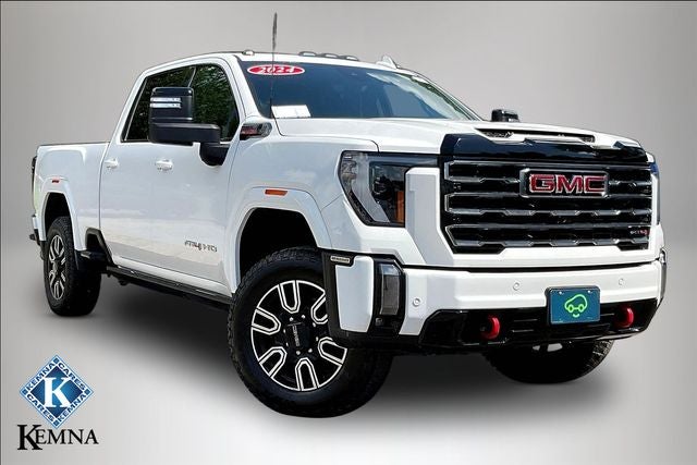 2024 GMC Sierra 2500HD 4WD Crew Cab Standard Bed AT4 in Summit White — front three-quarter view