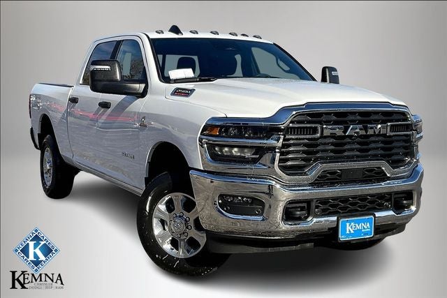 2025 RAM Ram 2500 RAM 2500 BIG HORN CREW CAB 4X4 6'4' BOX in Bright White Clear-Coat Exterior Paint — front three-quarter view