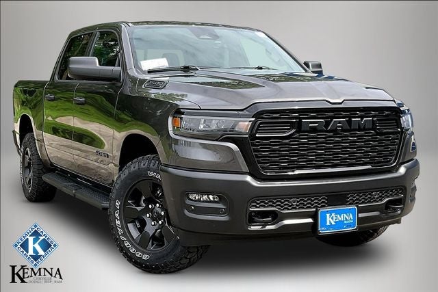 2026 RAM Ram 1500 RAM 1500 WARLOCK CREW CAB 4X4 5'7' BOX in Granite Crystal Metallic Clear-Coat Exterior Paint — front three-quarter view